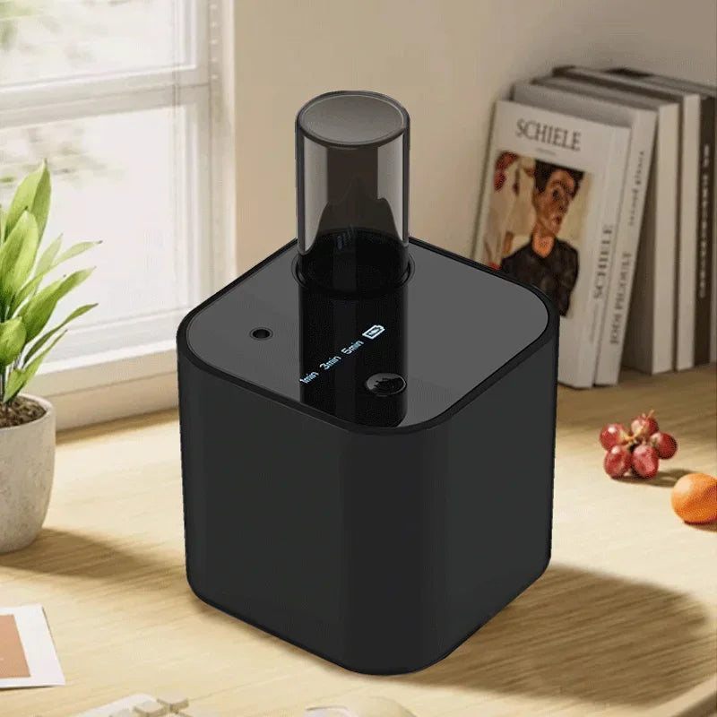 Modern black essential oil diffuser on table for clean, fresh air in home setting