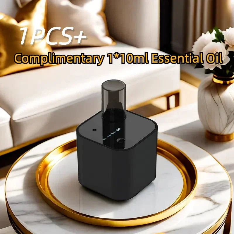 Modern black essential oil diffuser on elegant marble table in a stylish living room